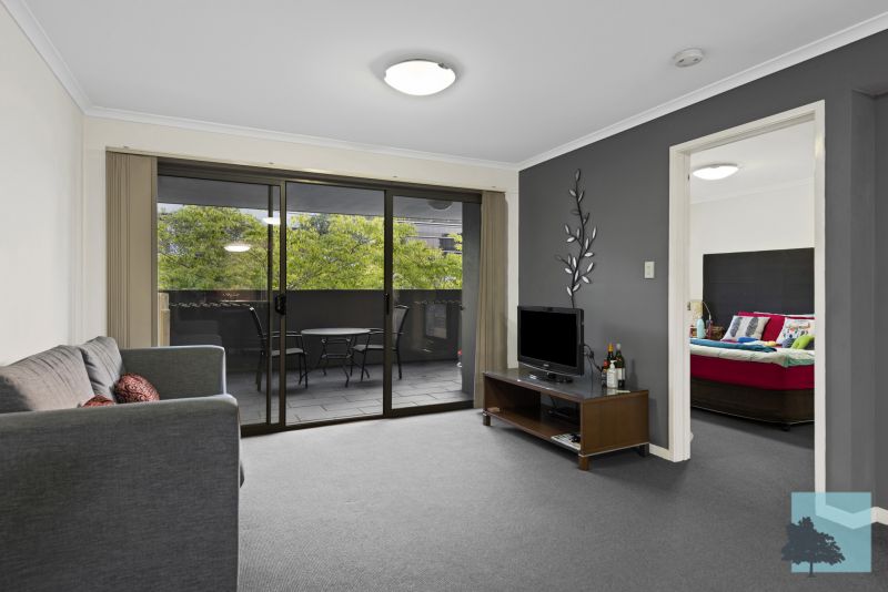Apartment living room with sliding doors to a balcony